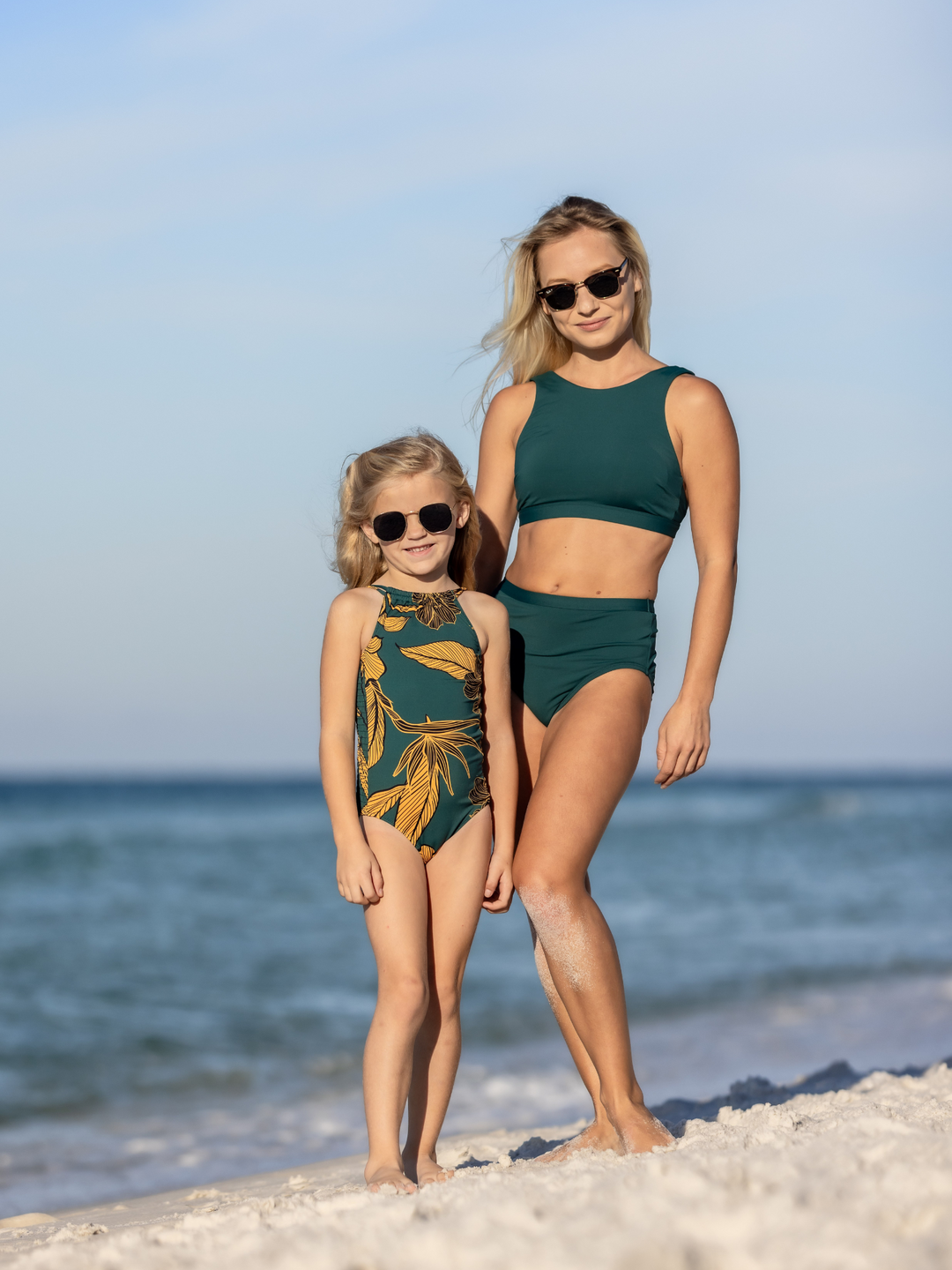 Girl's Emerald Enchantment One Piece Swimsuit – Girl's swimwear, Worn by girl on the beach in Florida, with Mom in coordinating swimsuit